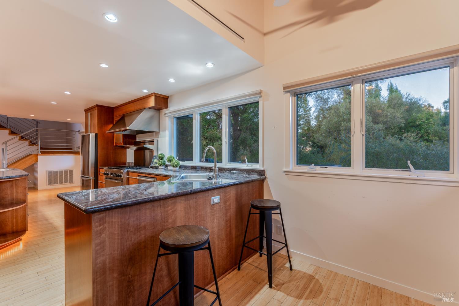 8301 West Potter Valley Road Potter Valley, CA 95469 - Photo 6 of 88 a kitchen with stainless steel appliances granite countertop sink stove and refrigerator