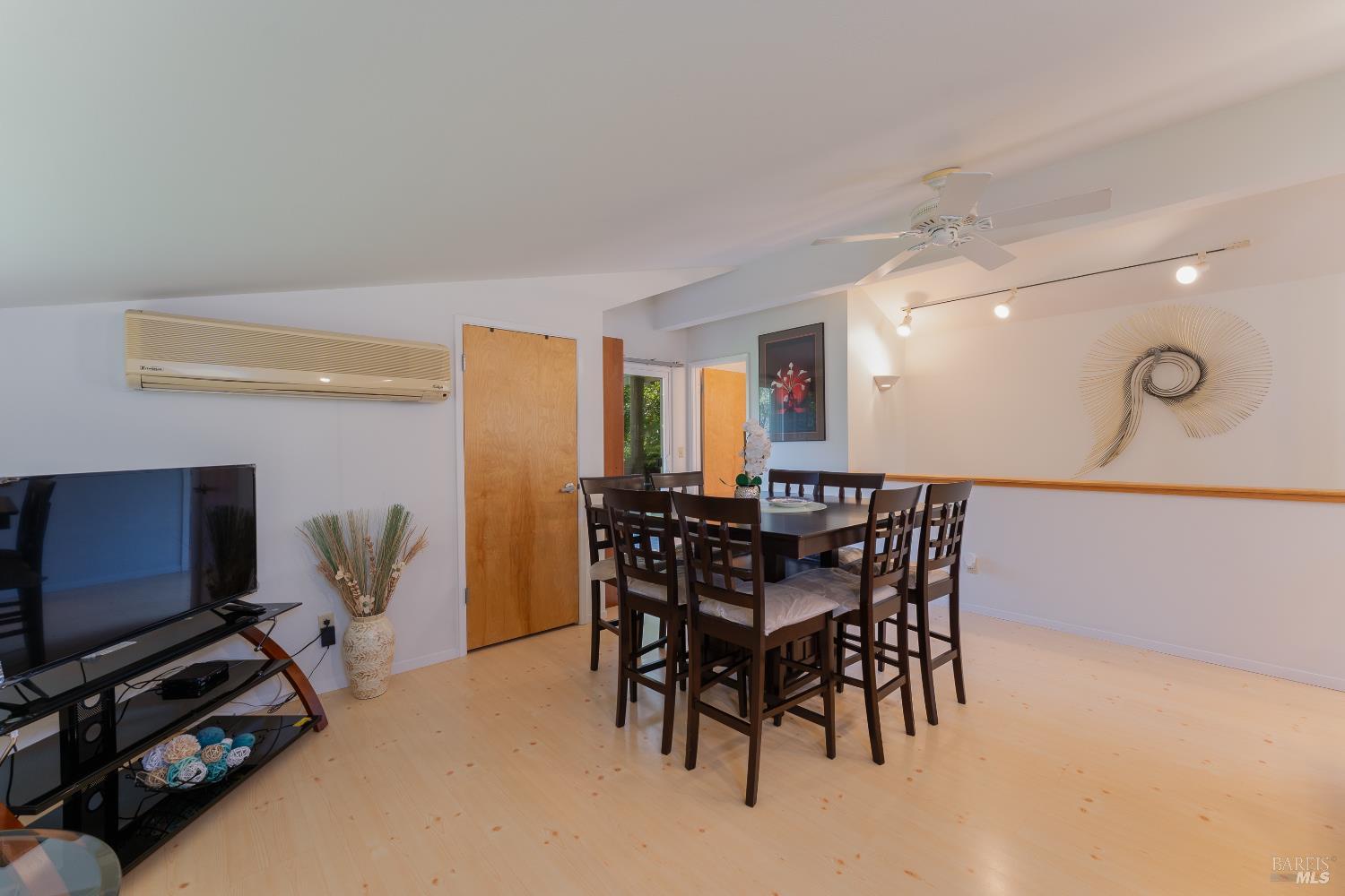 8301 West Potter Valley Road Potter Valley, CA 95469 - Photo 74 of 88 a view of a dining room with furniture and a flat screen tv
