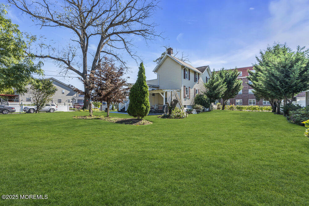 401 Joline Avenue Long Branch, NJ 07740 - Photo 28 of 30 a front view of house with yard and green space