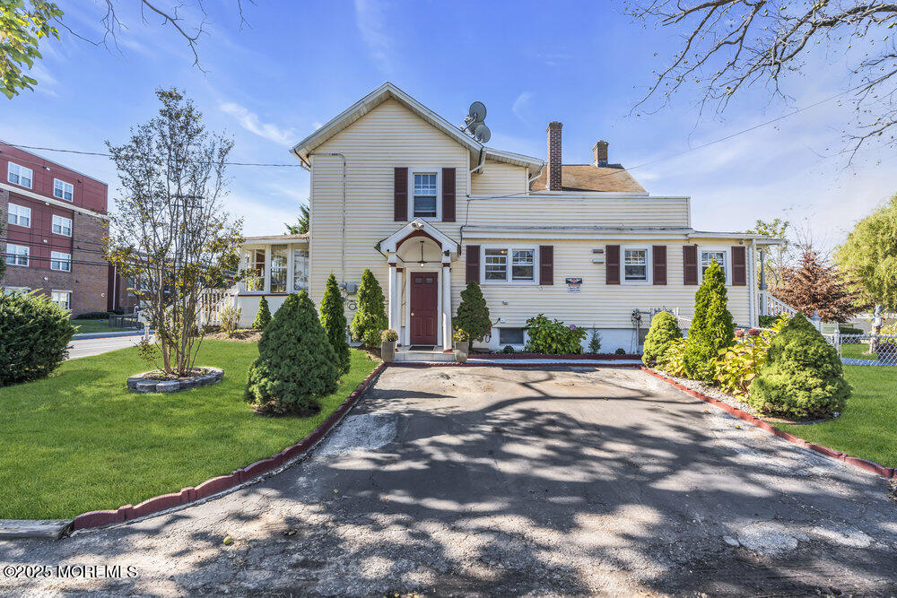 401 Joline Avenue Long Branch, NJ 07740 - Photo 30 of 30 a front view of a house with a yard