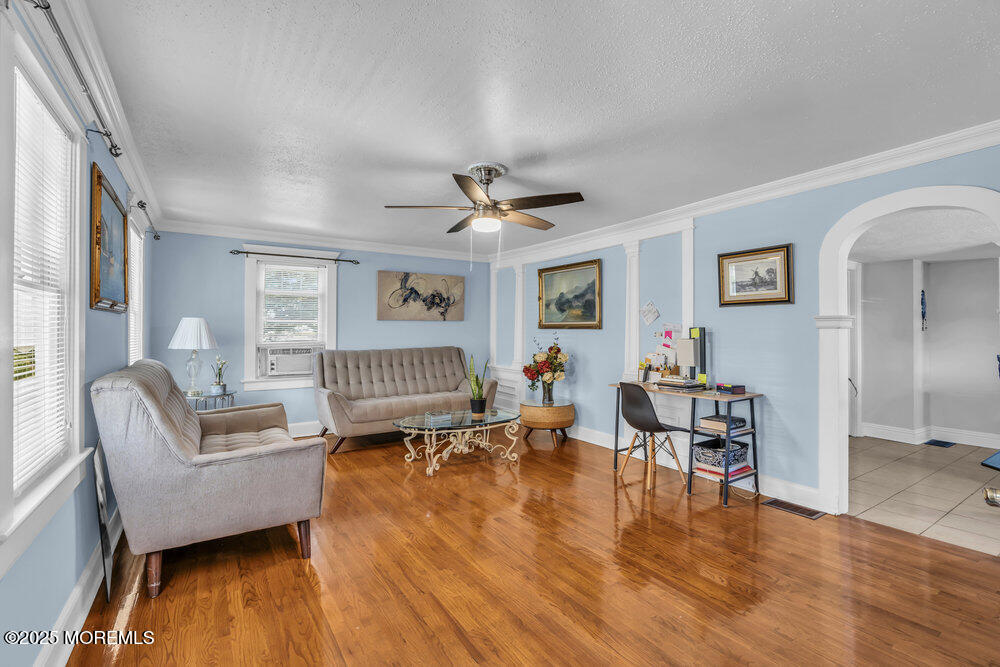 401 Joline Avenue Long Branch, NJ 07740 - Photo 4 of 30 a living room with furniture and a wooden floor