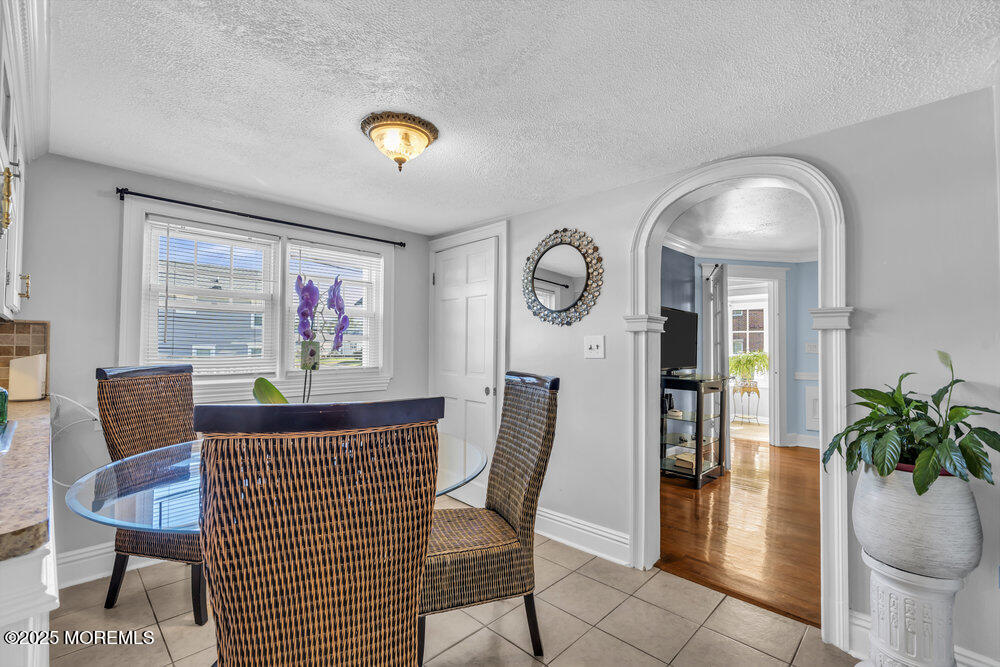 401 Joline Avenue Long Branch, NJ 07740 - Photo 6 of 30 a view of a livingroom with furniture and a potted plant