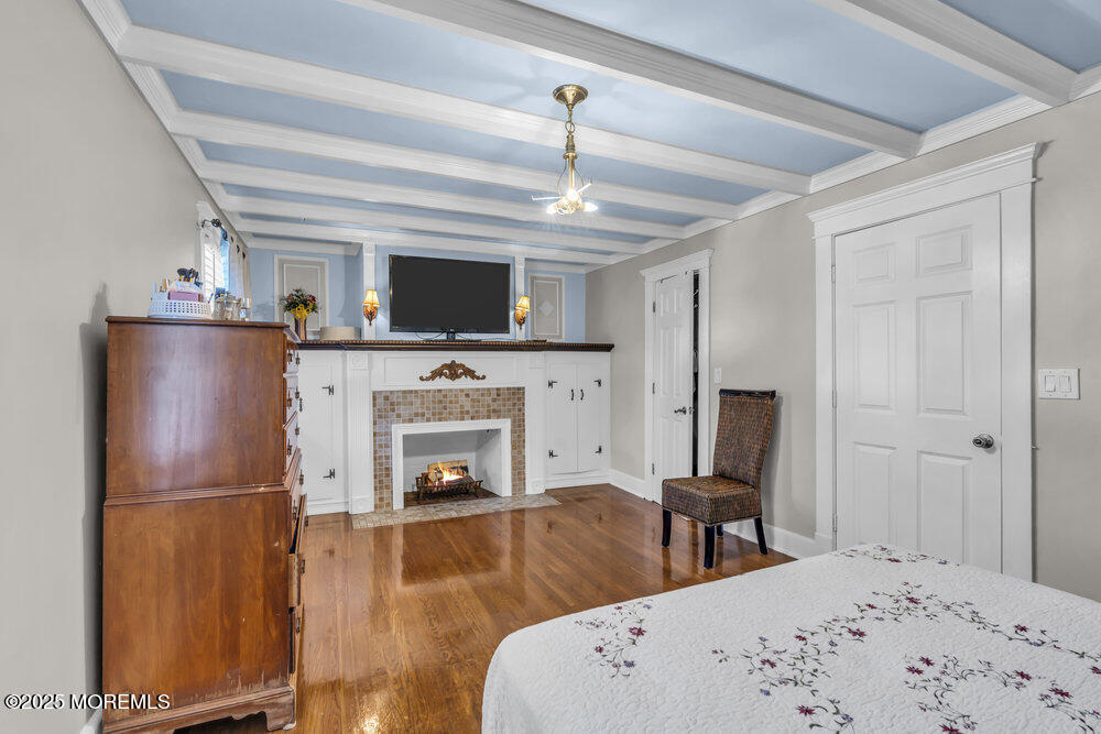 401 Joline Avenue Long Branch, NJ 07740 - Photo 10 of 30 a living room with furniture and a flat screen tv