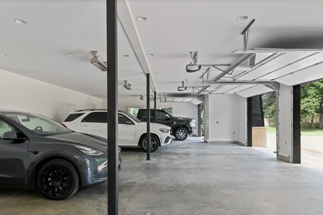 a bathroom with a granite countertop sink mirror and vanity