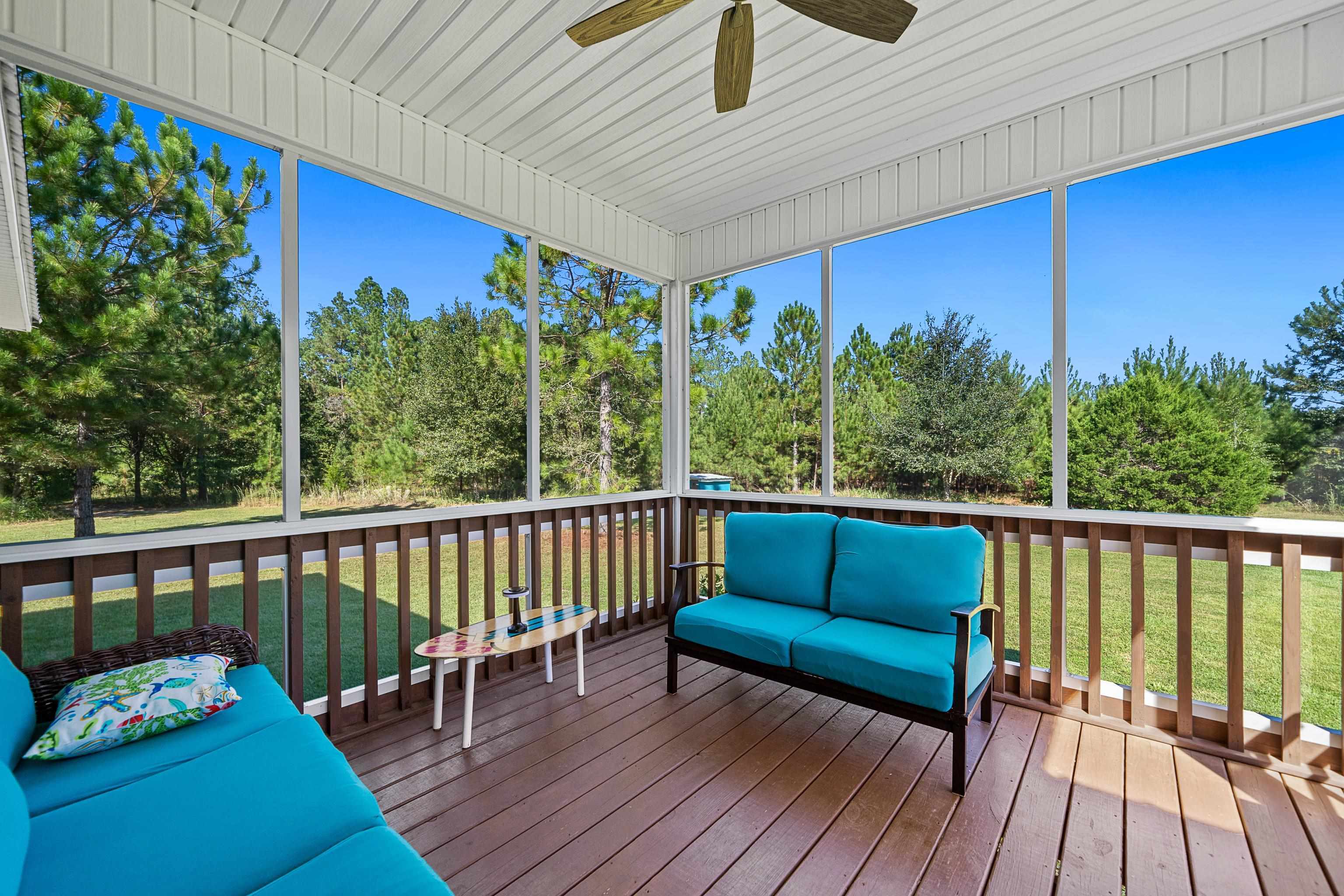 24616 Bretz Lane Elberta, AL 36530 - Photo 33 of 42 Relaxing screened porch overlooking peaceful yard.