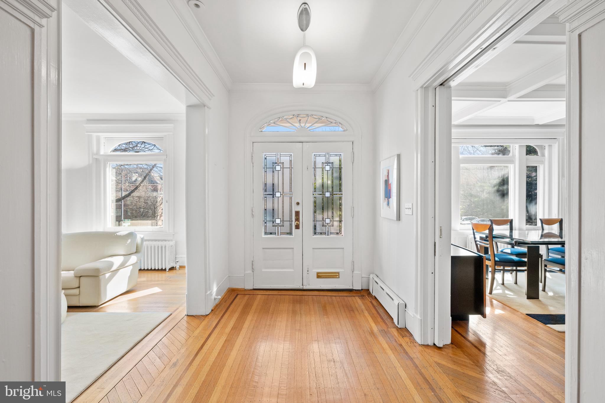 2862 28th Street Northwest Washington, DC 20008 - Photo 3 of 26 a view of a hallway view with wooden floor and a living room