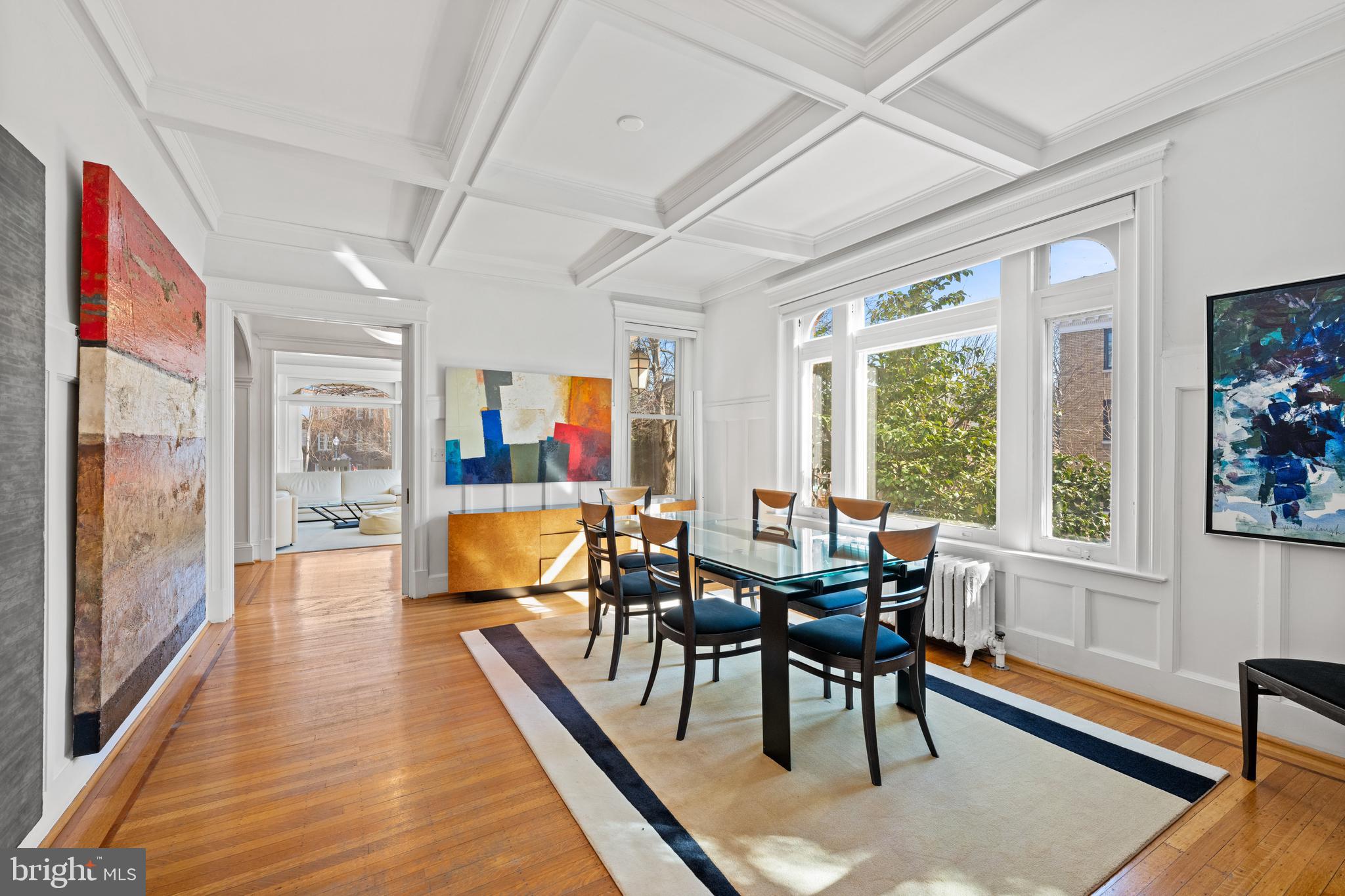 2862 28th Street Northwest Washington, DC 20008 - Photo 7 of 26 a dining room with wooden floor and large windows