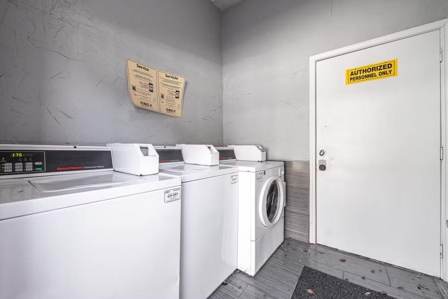 5414 Reiger Avenue, Unit 8 Dallas, TX 75214 - Photo 14 of 14 a utility room with dryer and washer