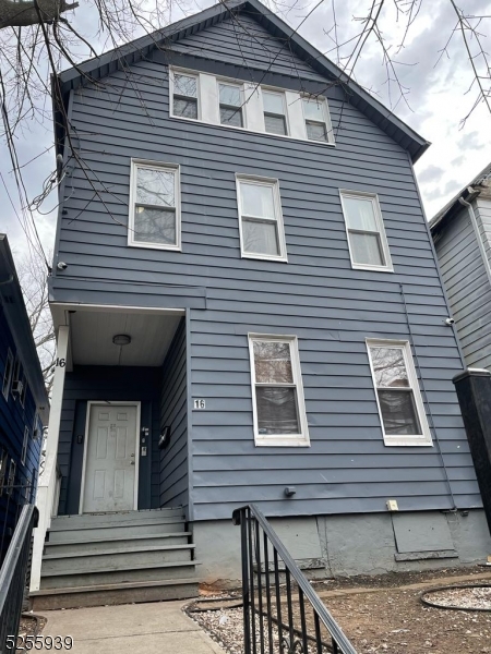 16 Alexander Street, Unit 2 Newark, NJ 07106 - Photo 8 of 8 a view of a house with more windows and brick walls