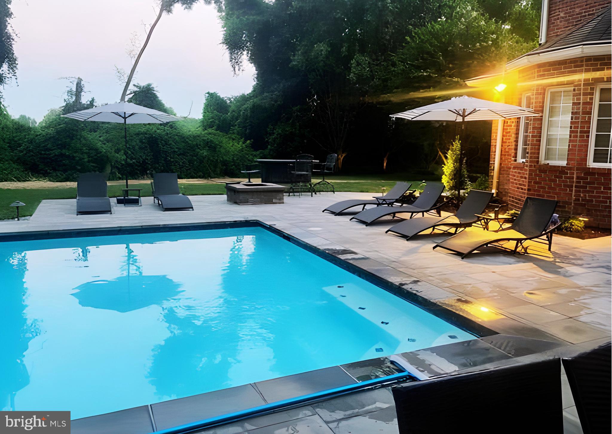 600 Traveller Court Lothian, MD 20711 - Photo 47 of 55 Evening view of illuminated pool