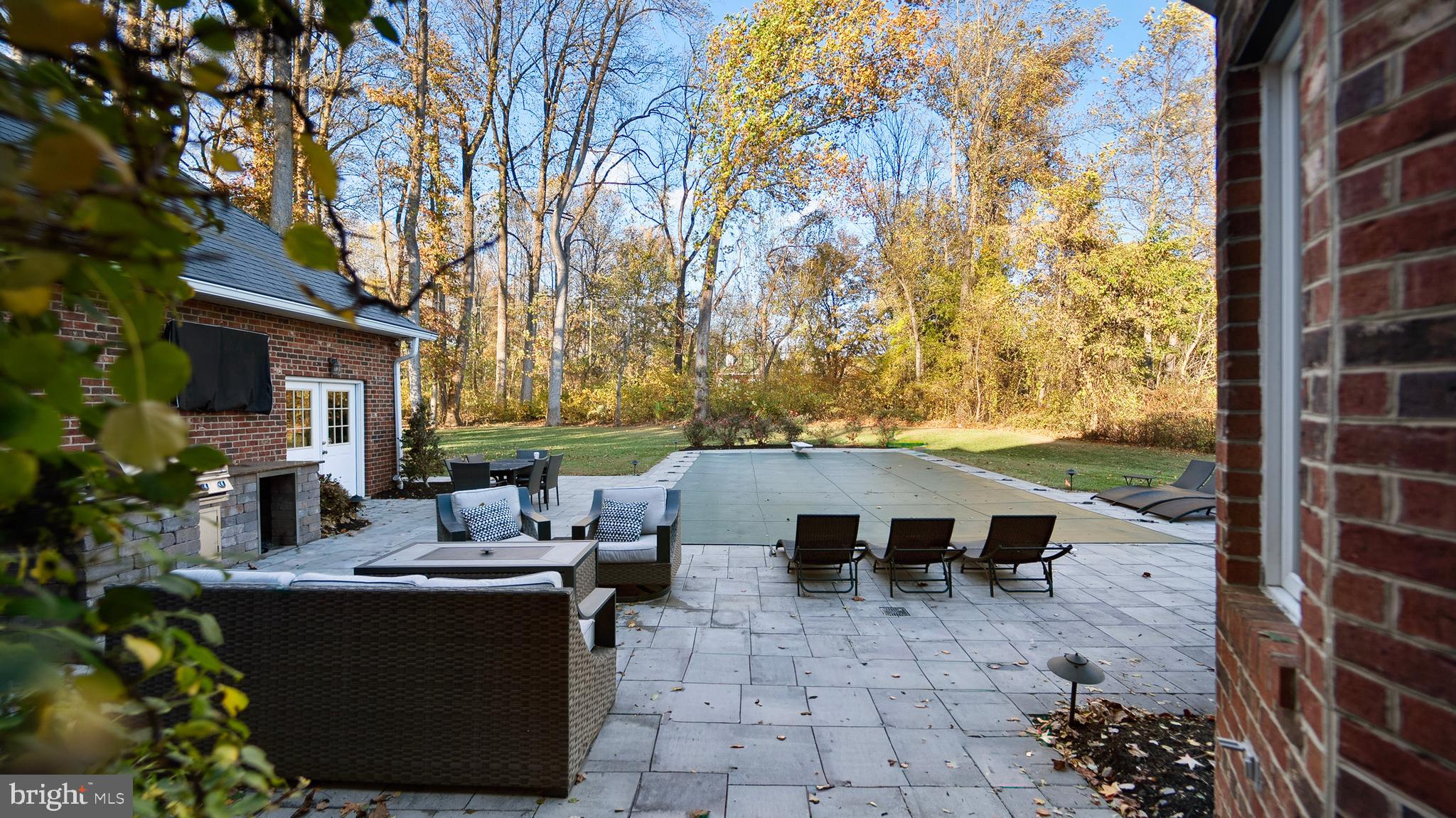 600 Traveller Court Lothian, MD 20711 - Photo 51 of 55 View from the indoor walkout w/ poolside fire pit