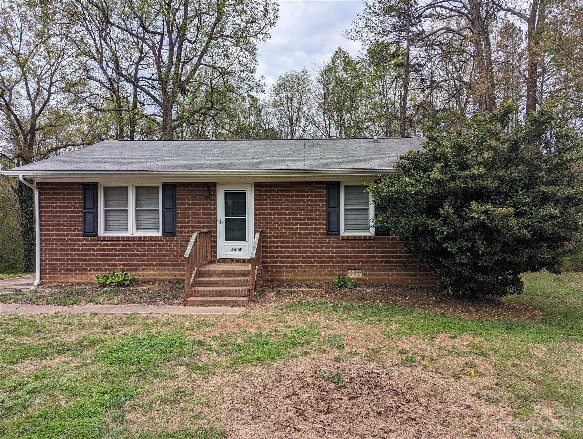 3525 Hickory Place Salisbury, NC 28144 - Photo 1 of 33 a front view of a house with garden