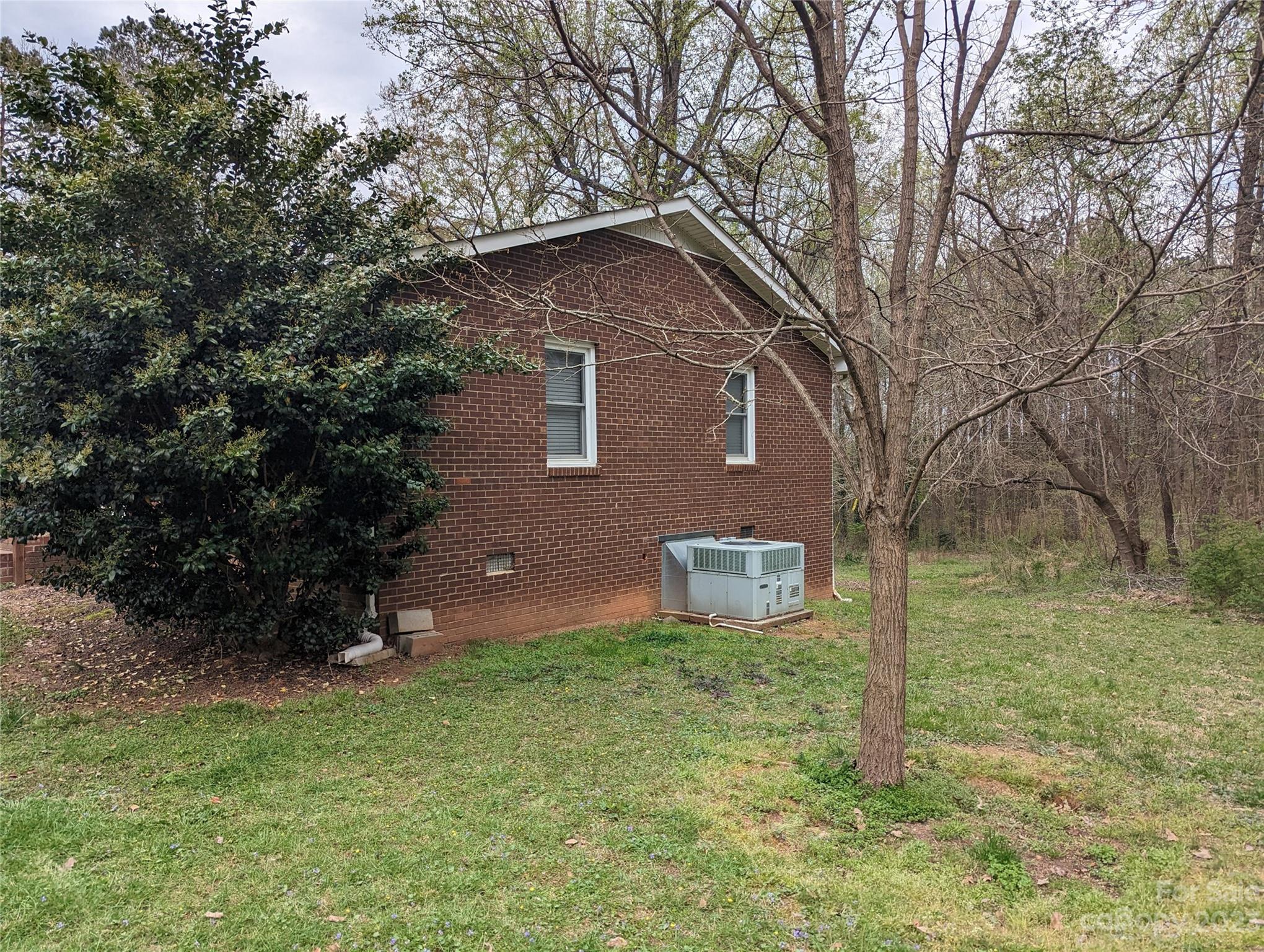 3525 Hickory Place Salisbury, NC 28144 - Photo 17 of 33 a house that has a tree in front of it