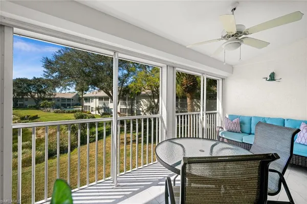 a view of a living room and a porch