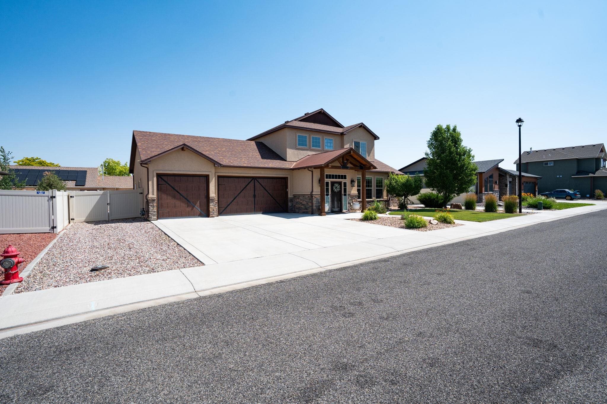 1139 Aspen Village Loop Fruita, CO 81521 - Photo 1 of 21 a view of house with outdoor space and street view