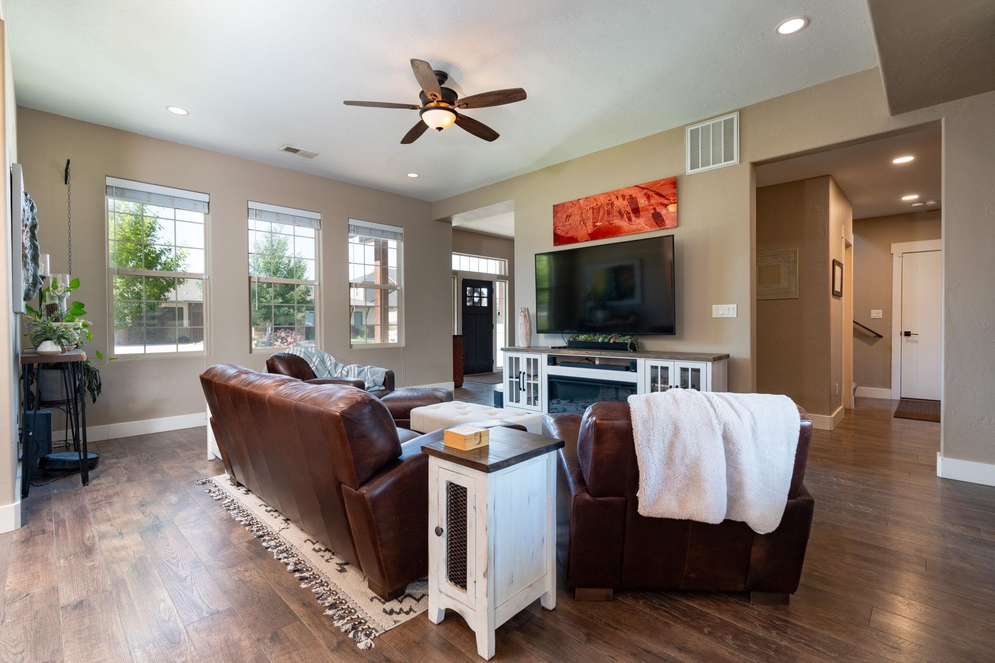 1139 Aspen Village Loop Fruita, CO 81521 - Photo 6 of 21 a living room with furniture and a flat screen tv