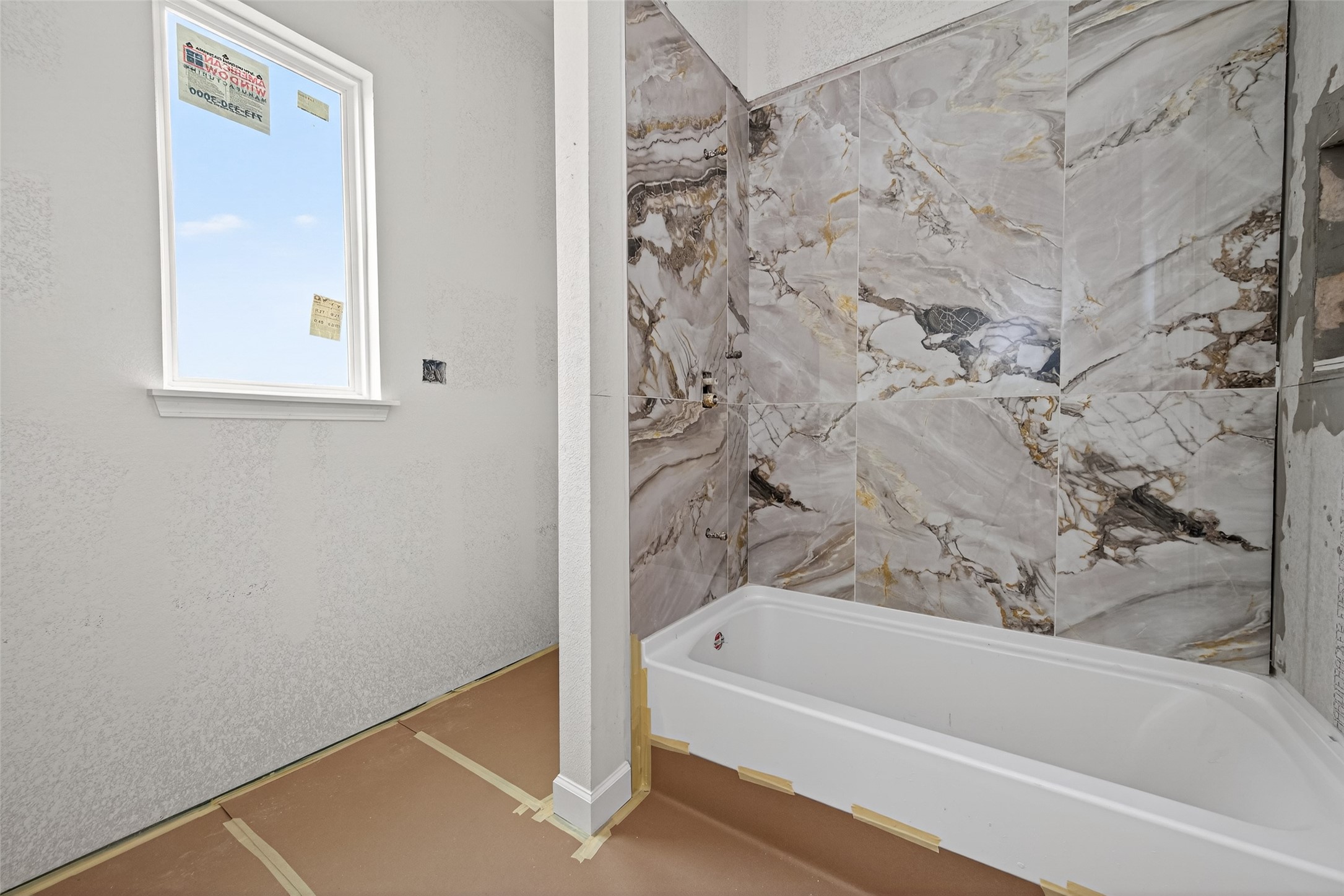 1202 Peter Pne Street Huffman, TX 77336 - Photo 11 of 12 a bathroom with a bathtub and a shower