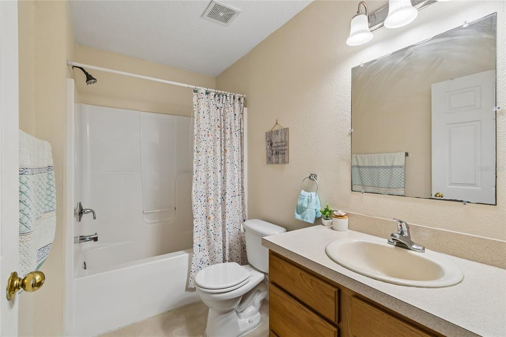468 North Wheeler Avenue Inverness, FL 34453 - Photo 14 of 24 a bathroom with a sink toilet and shower