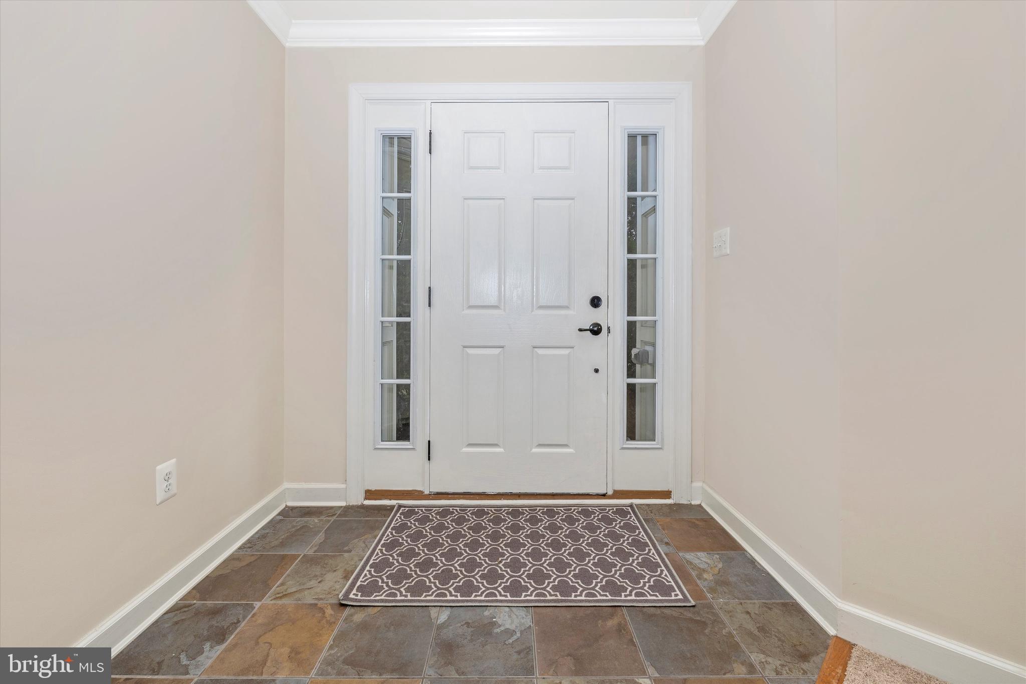 9733 Braidwood Terrace Frederick, MD 21704 - Photo 2 of 50 Large Entry w/Tile Floors & Crown
