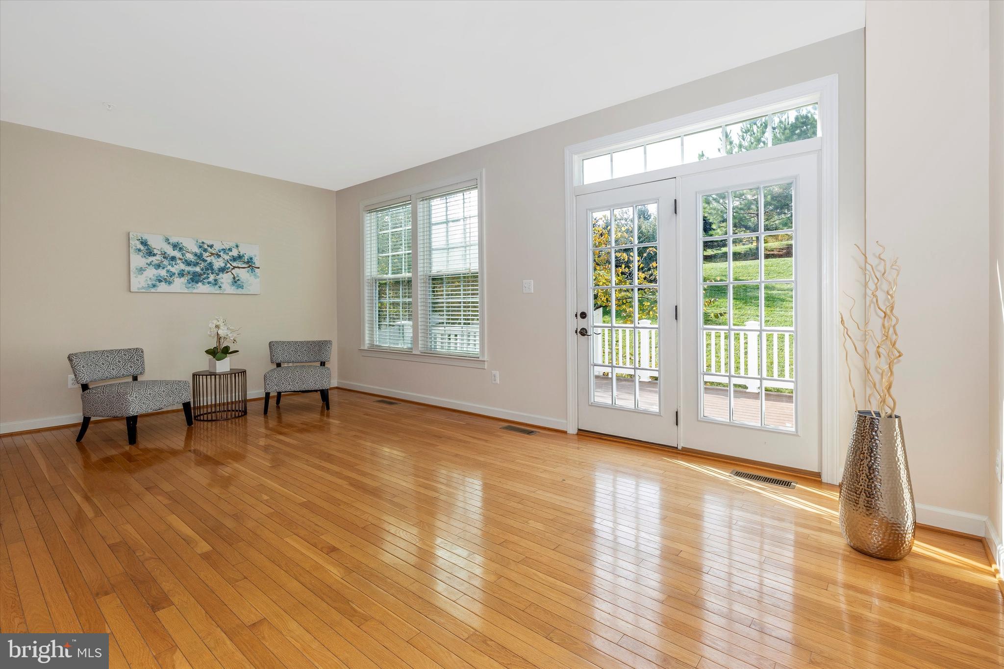 9733 Braidwood Terrace Frederick, MD 21704 - Photo 13 of 50 Family Room w/French doors to deck
