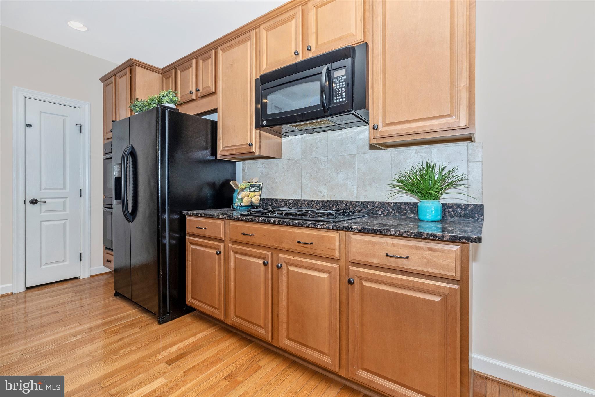 9733 Braidwood Terrace Frederick, MD 21704 - Photo 18 of 50 Pantry & built-in micro