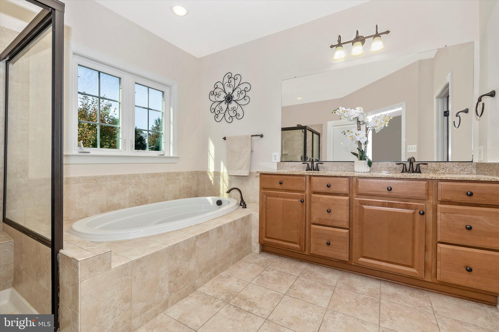 9733 Braidwood Terrace Frederick, MD 21704 - Photo 31 of 50 Owner's Luxury bath w/large soaking tub