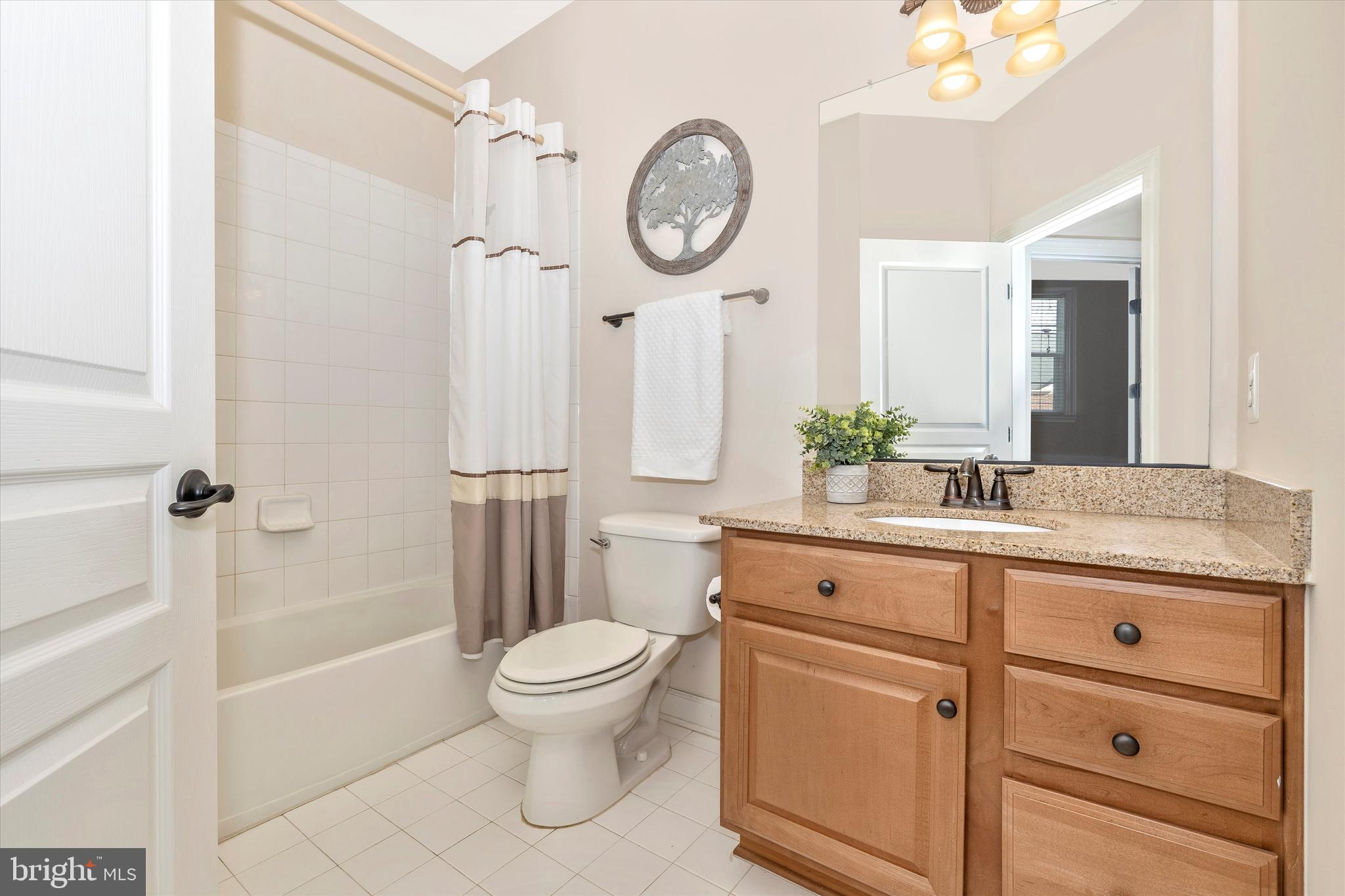 9733 Braidwood Terrace Frederick, MD 21704 - Photo 37 of 50 Upper level hall bath w/granite vanity top
