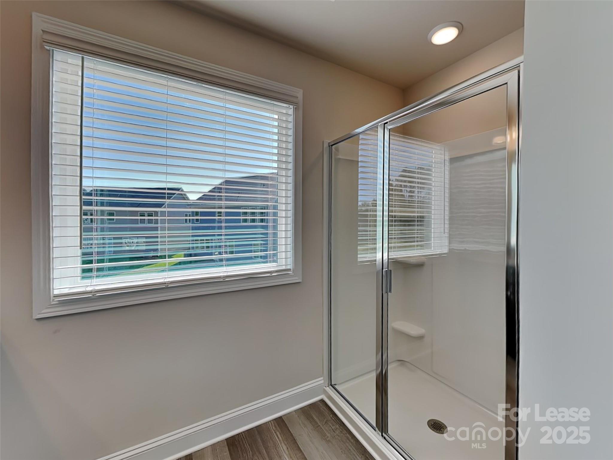212 Queenshall Road Mooresville, NC 28117 - Photo 10 of 15 a view of a bathroom with a window