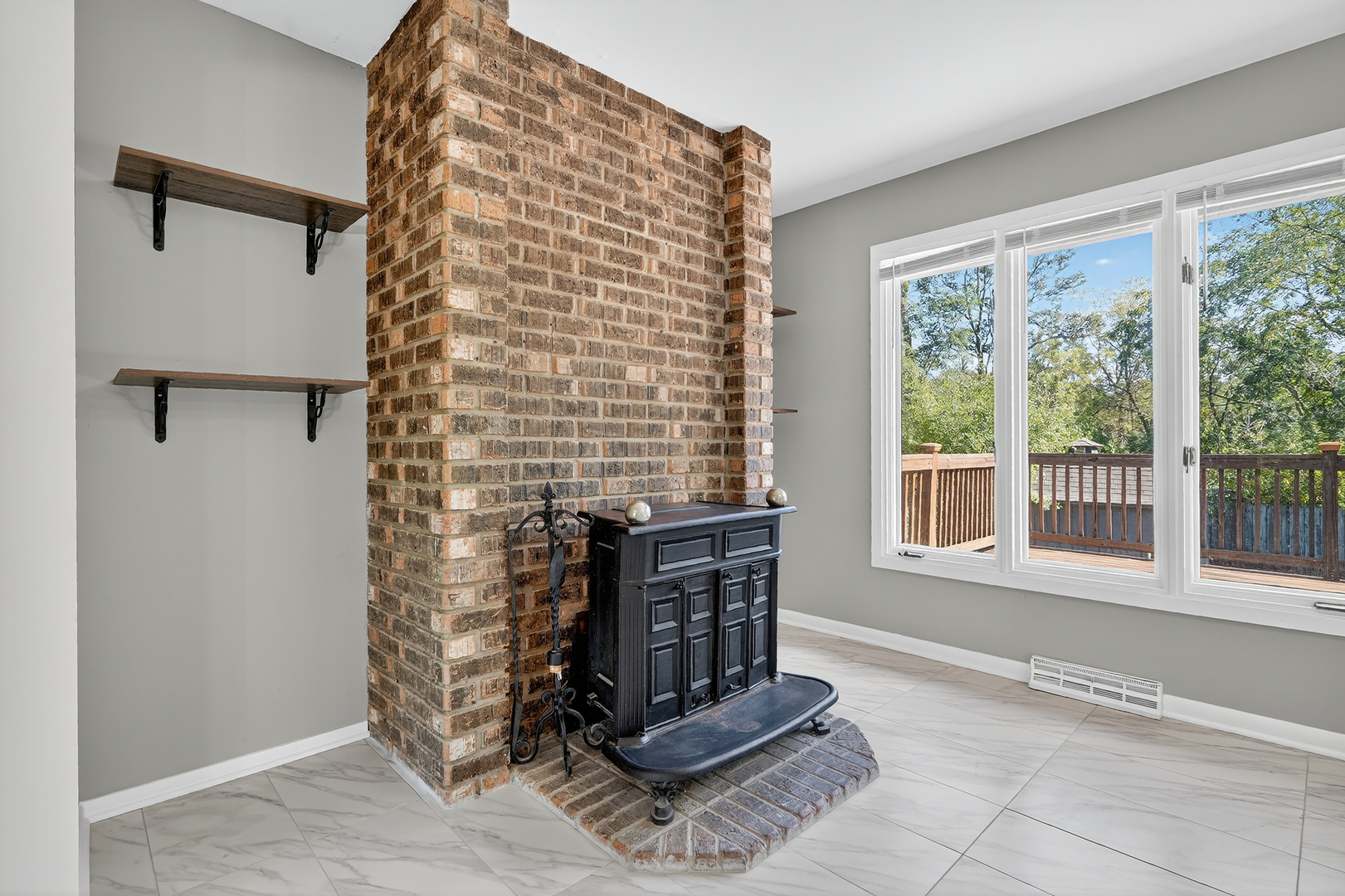 1245 Winaki Trail Algonquin, IL 60102 - Photo 14 of 39 a living room with a fireplace