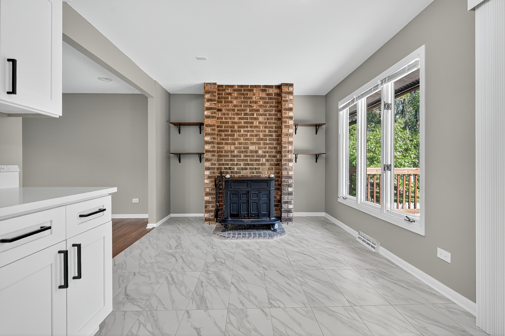 1245 Winaki Trail Algonquin, IL 60102 - Photo 20 of 39 a living room with furniture and a fireplace