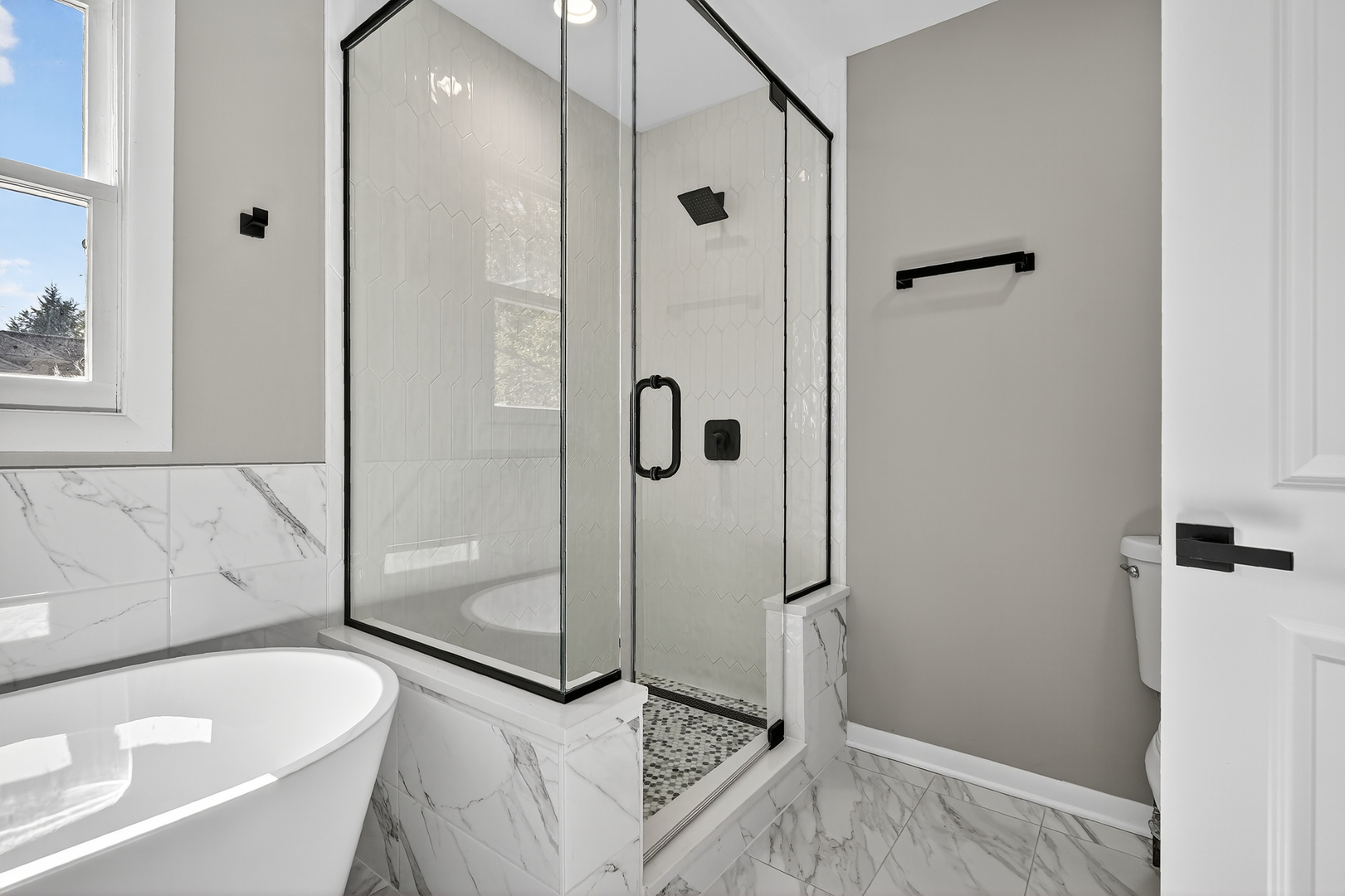 1245 Winaki Trail Algonquin, IL 60102 - Photo 27 of 39 a bathroom with a tub and a shower