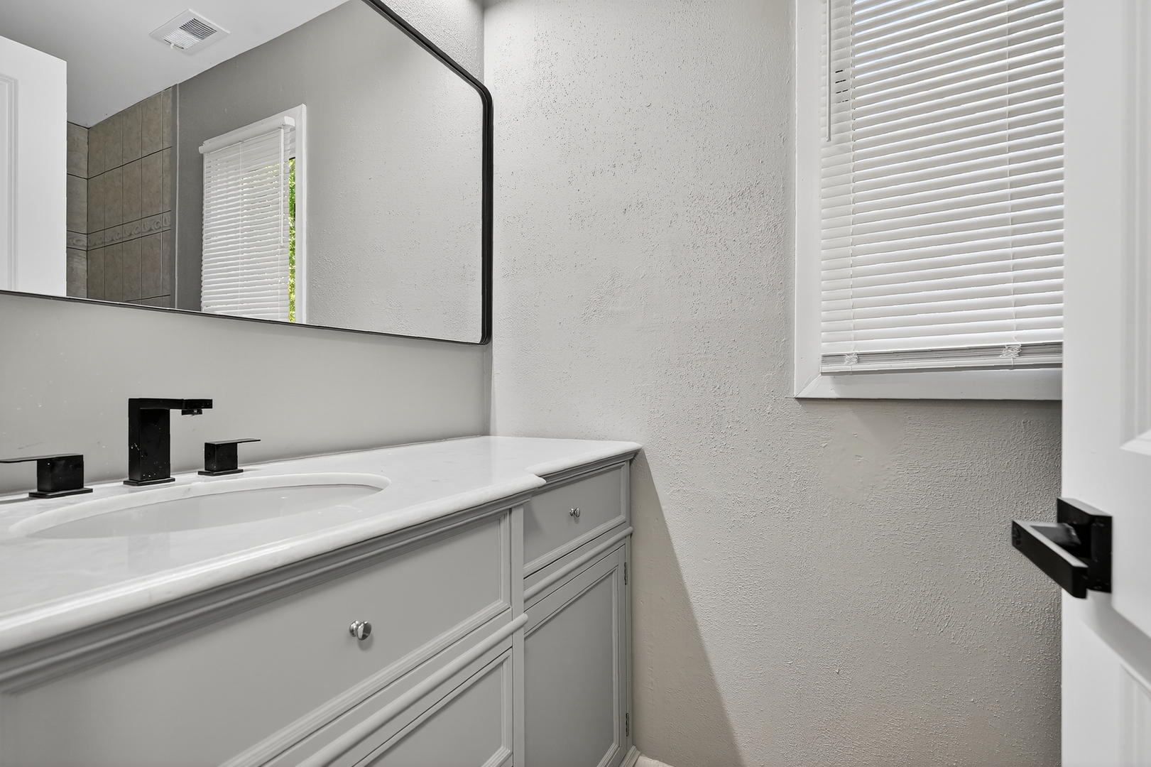 1245 Winaki Trail Algonquin, IL 60102 - Photo 34 of 39 a bathroom with a sink and a mirror