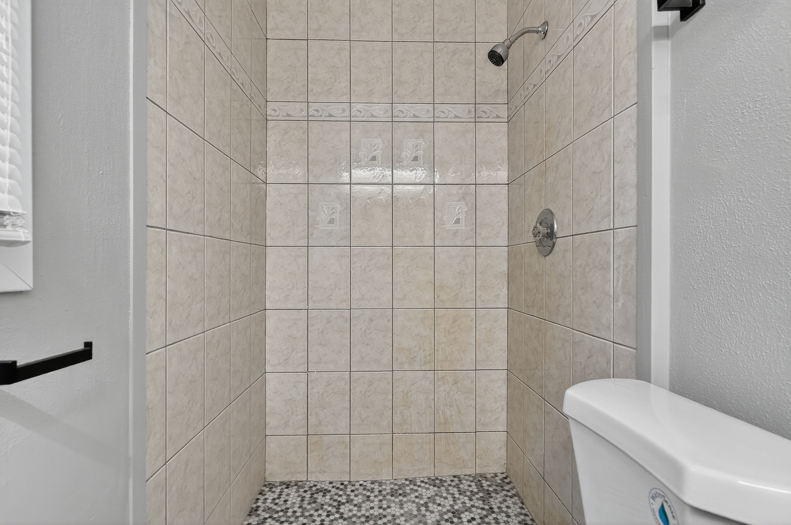 1245 Winaki Trail Algonquin, IL 60102 - Photo 35 of 39 a bathroom with a toilet and a shower