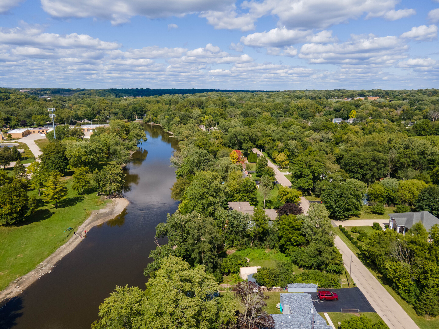 1245 Winaki Trail Algonquin, IL 60102 - Photo 6 of 39 a view of a lake with houses