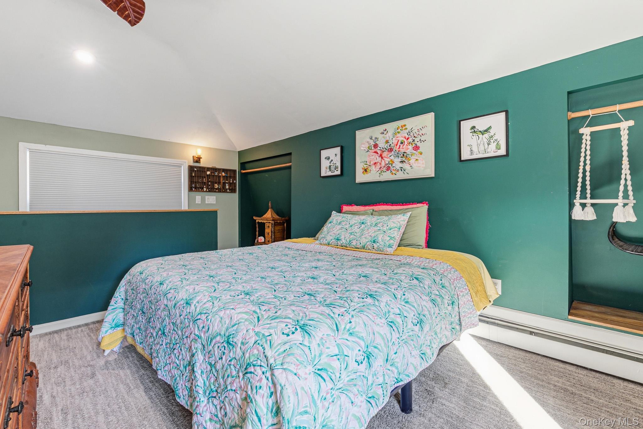 33 Lillian Road Nesconset, NY 11767 - Photo 25 of 42 Another View Of The Stunning Primary Bedroom Suite Offering Beautiful Vaulted/Tray Ceilings, Recessed Lighting, Ceiling Fan, Oversized Windows For Natural Light, Beautiful Details Including Two Wall Cut Outs/Niches, Ample Room For A Large Bedroom Set/Furniture, A Large Walk In Closet With Built In Cabinetry/Shelving & Storage, And A Stunning New Primary Bathroom.