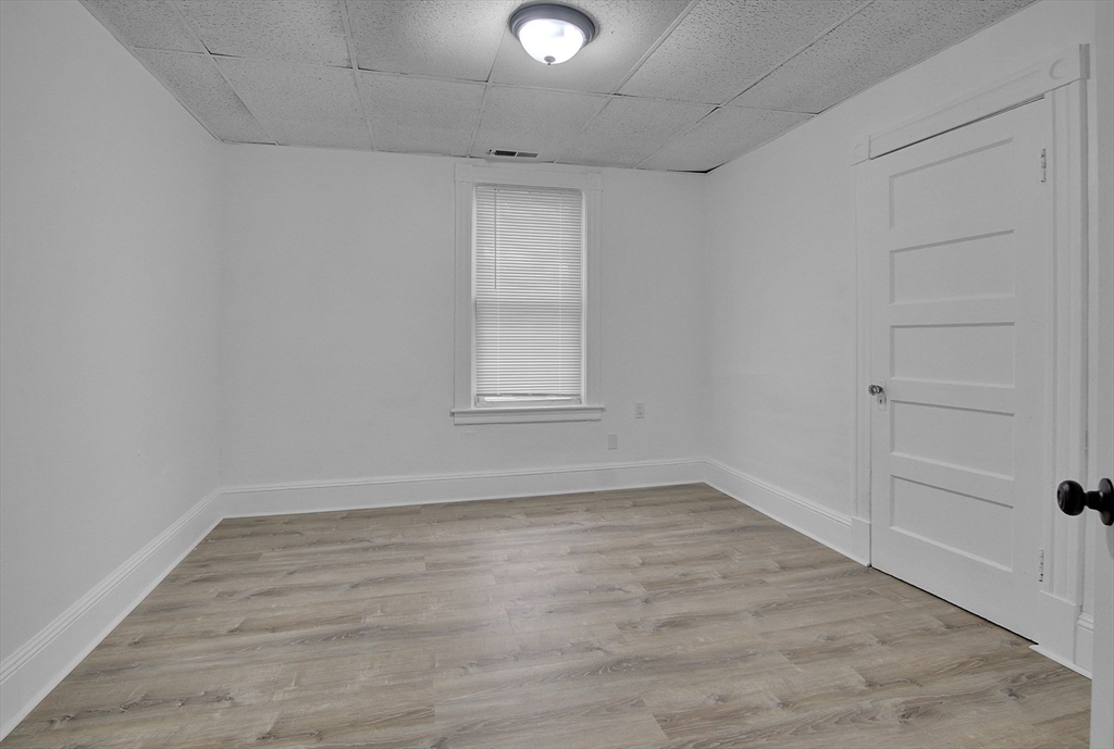 1397 Worcester Street, Unit 2 Springfield, MA 01151 - Photo 7 of 15 wooden floor in an empty room
