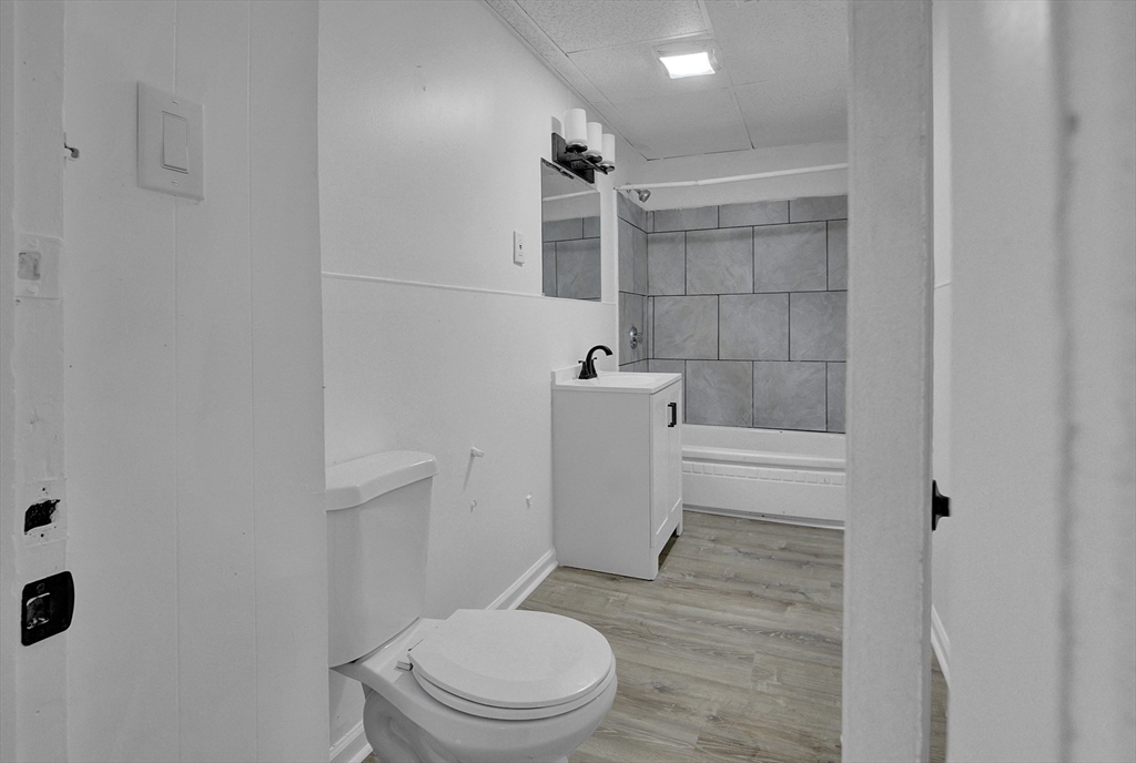 1397 Worcester Street, Unit 2 Springfield, MA 01151 - Photo 10 of 15 a bathroom with a toilet and a shower