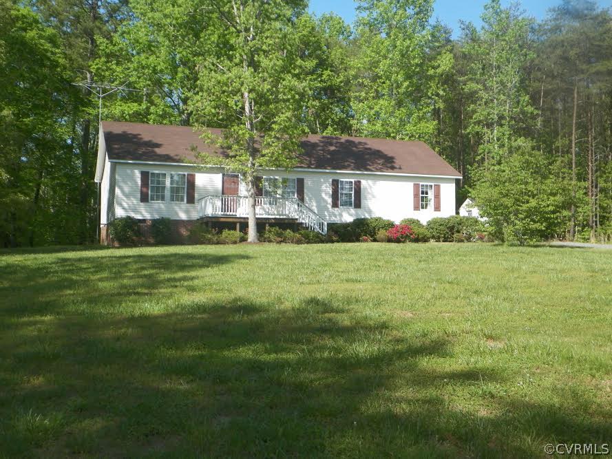 4619 Venable Road Kents Store, VA 23084 - Photo 2 of 21 a front view of a house with a yard