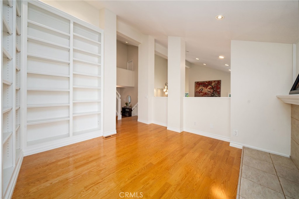 49 Pinewood, Unit 25 Irvine, CA 92604 - Photo 18 of 42 a view of empty room with wooden floor