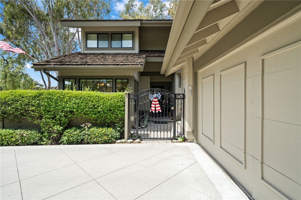 49 Pinewood, Unit 25 Irvine, CA 92604 - Photo 3 of 42 a house view with a outdoor space