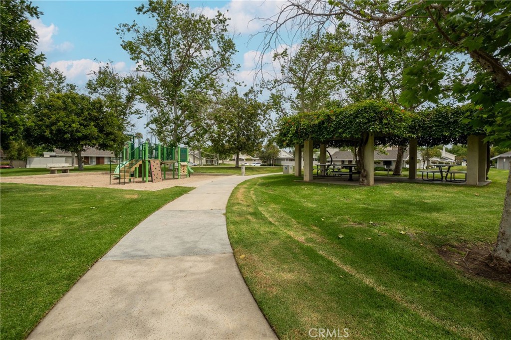 49 Pinewood, Unit 25 Irvine, CA 92604 - Photo 36 of 42 a huge green field with lots of trees