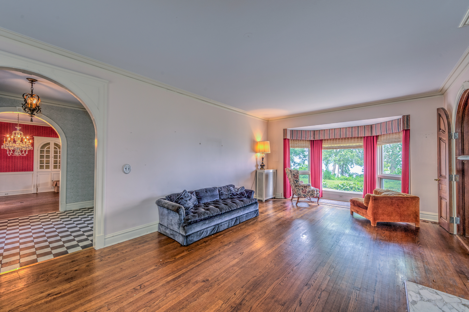141 Sheridan Road Winnetka, IL 60093 - Photo 11 of 58 a living room with furniture and a large window