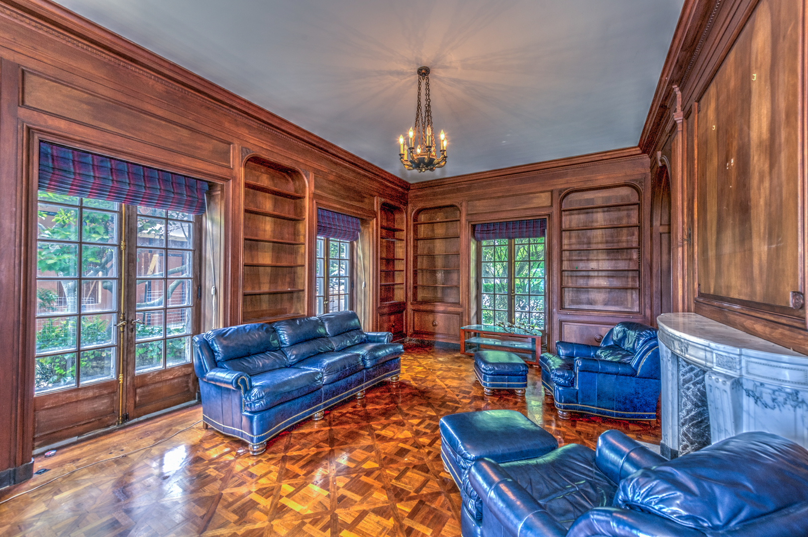 141 Sheridan Road Winnetka, IL 60093 - Photo 13 of 58 a living room with furniture a window and a chandelier