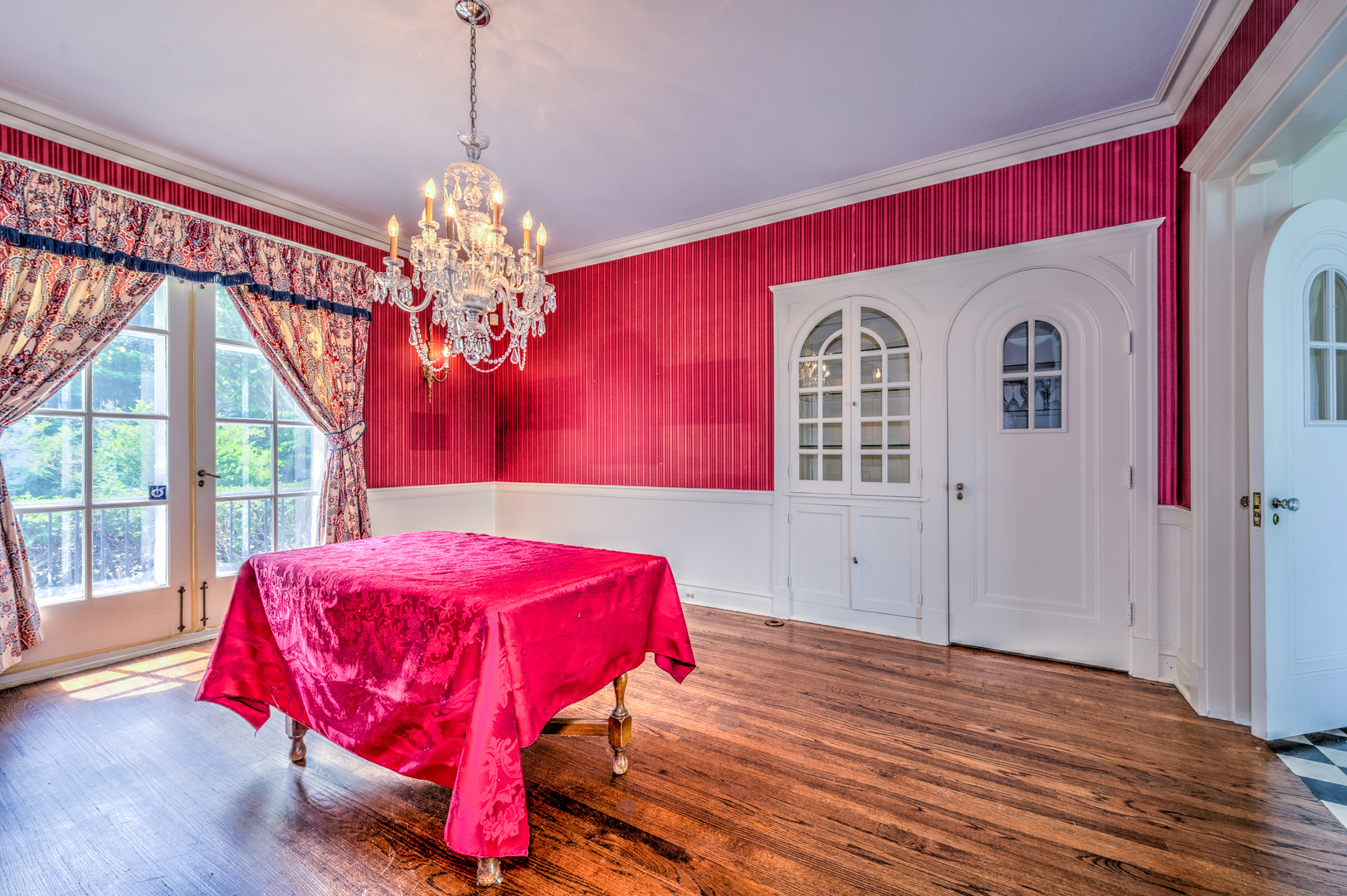 141 Sheridan Road Winnetka, IL 60093 - Photo 16 of 58 a bedroom with a bed and a chandelier