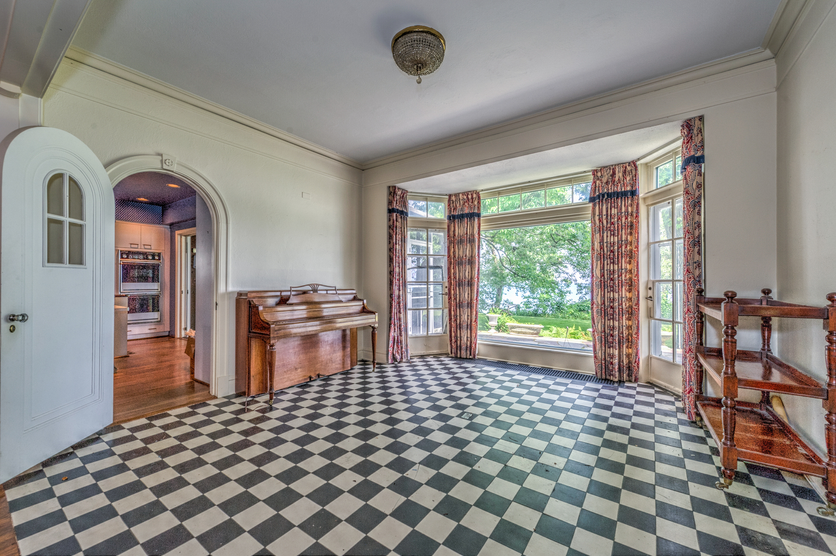 141 Sheridan Road Winnetka, IL 60093 - Photo 20 of 58 a living room with a couch and a table