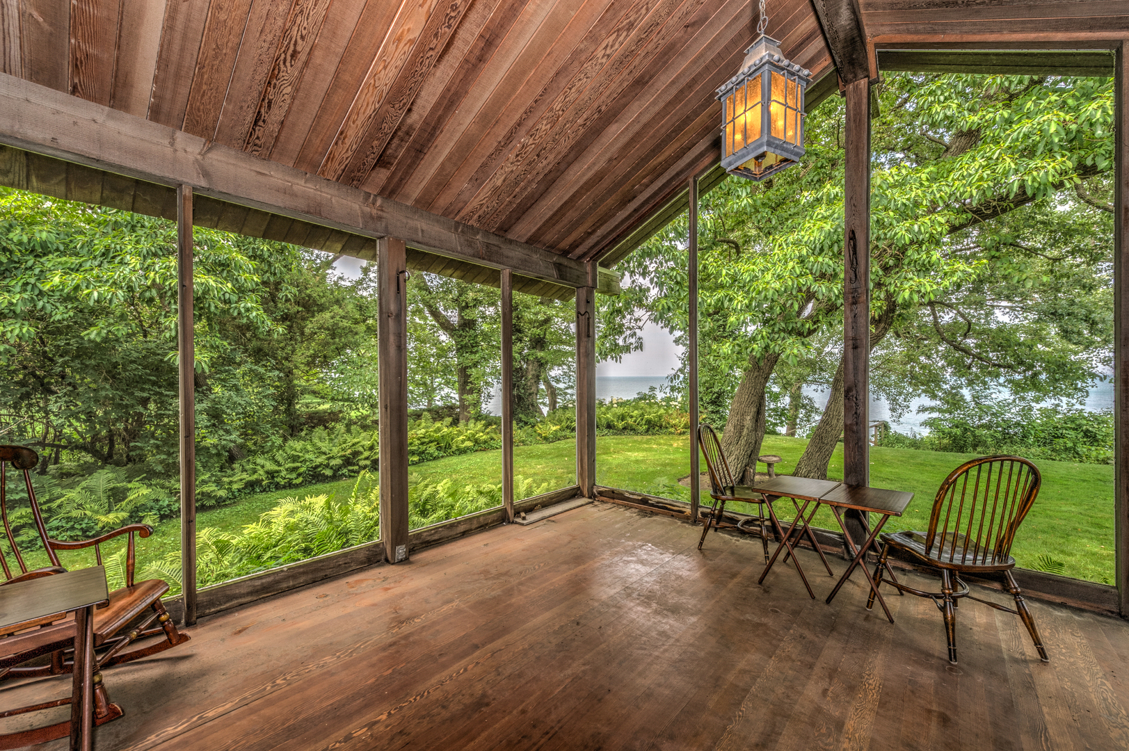 141 Sheridan Road Winnetka, IL 60093 - Photo 27 of 58 a view of a chairs and table in patio with a yard