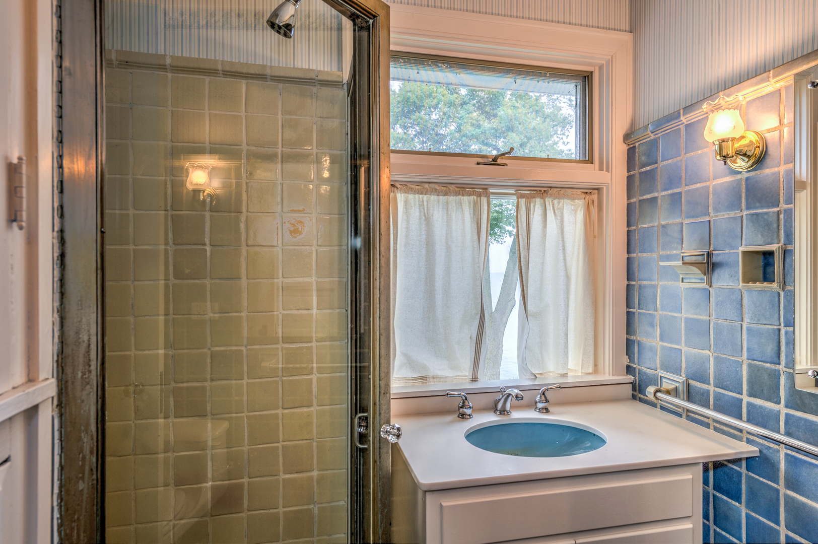 141 Sheridan Road Winnetka, IL 60093 - Photo 32 of 58 a bathroom with a sink and a window