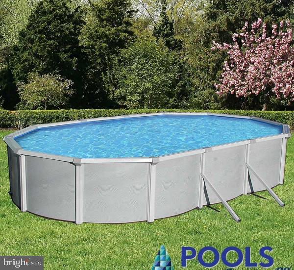 82 Georgia Road Pennsville, NJ 08070 - Photo 23 of 42 18x33 Oval Above Ground Pool