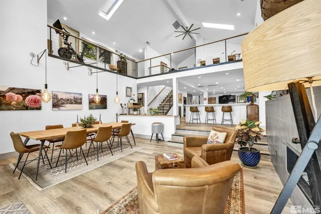 a living room with lots of furniture and a flat screen tv