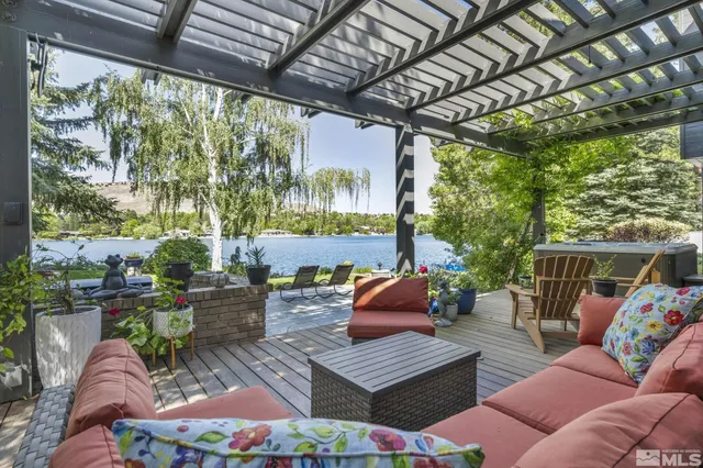 a outdoor living space with furniture and a garden view